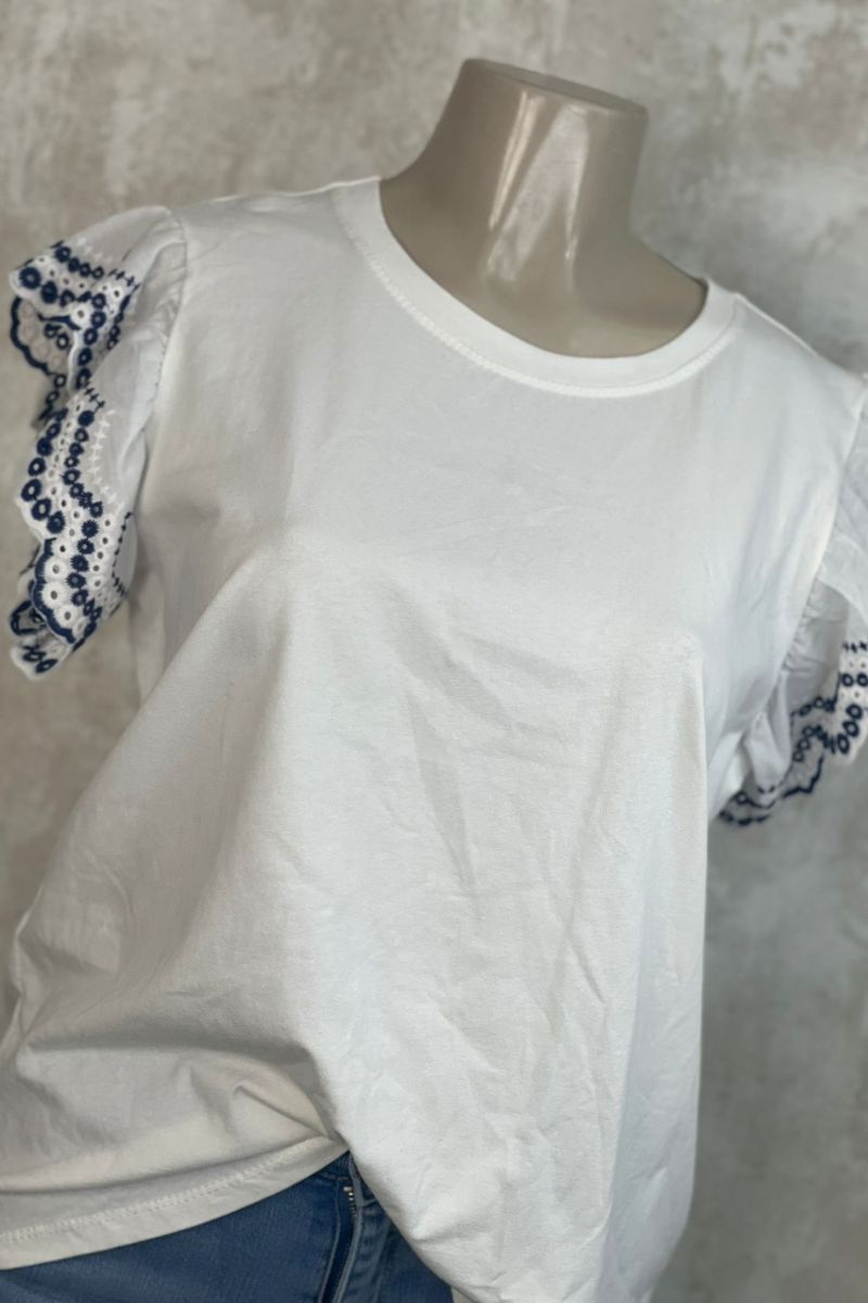 Camiseta con flecos